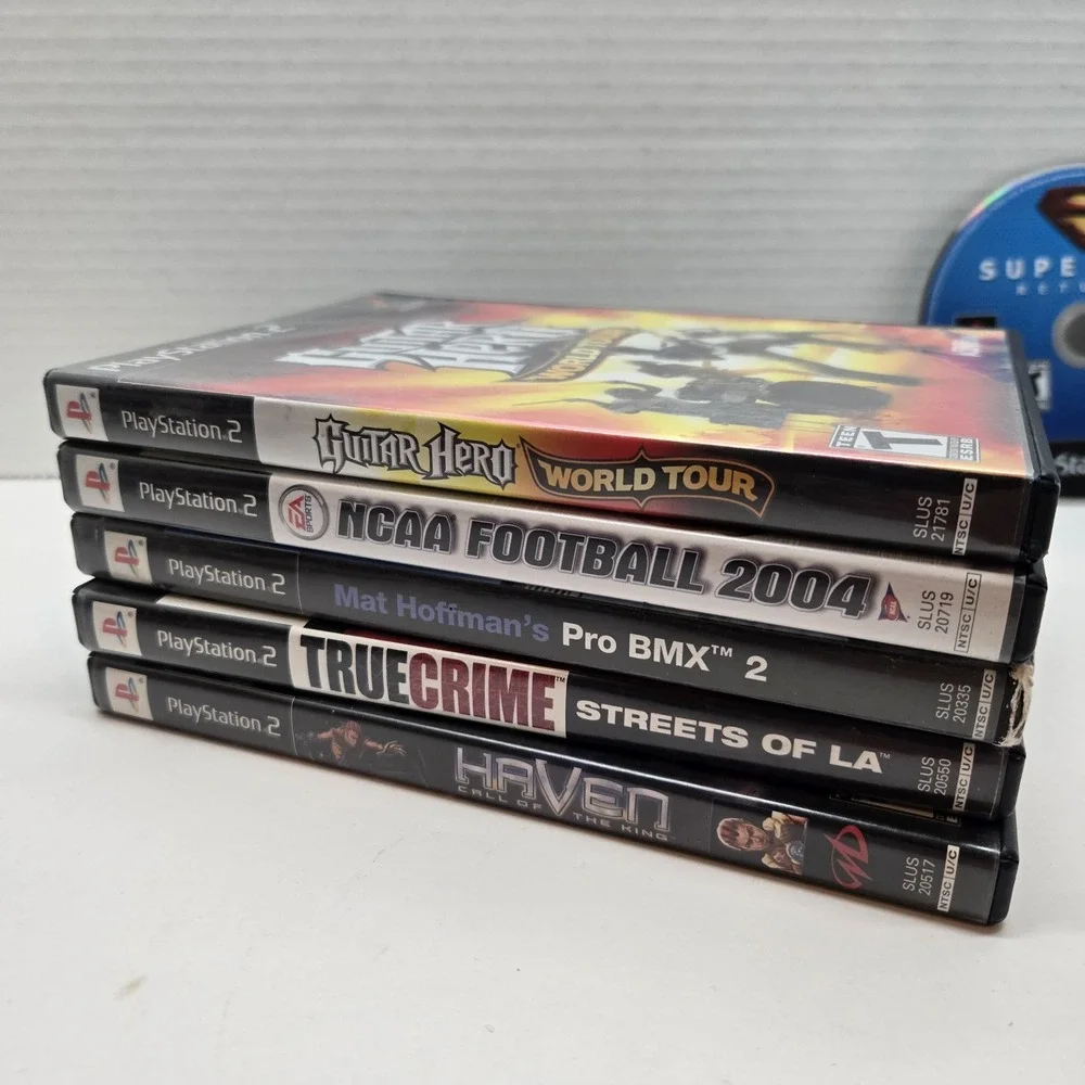 Six Sony PlayStation 2 PS2 Games Haven Pro BMX‎ 2 True Crime Ncaa Guitar Hero